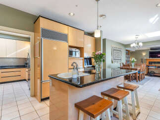 This stunning kitchen boasts modern design and functionality.