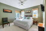 This inviting bedroom boasts a serene ambiance, perfect for relaxation.