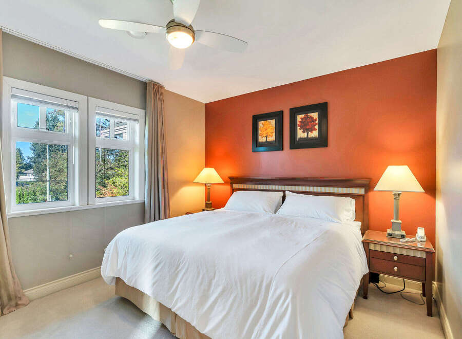 This inviting bedroom features a comfortable bed, perfect for relaxation.
