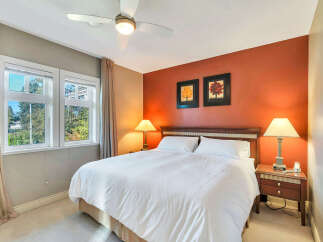 This inviting bedroom features a comfortable bed, perfect for relaxation.