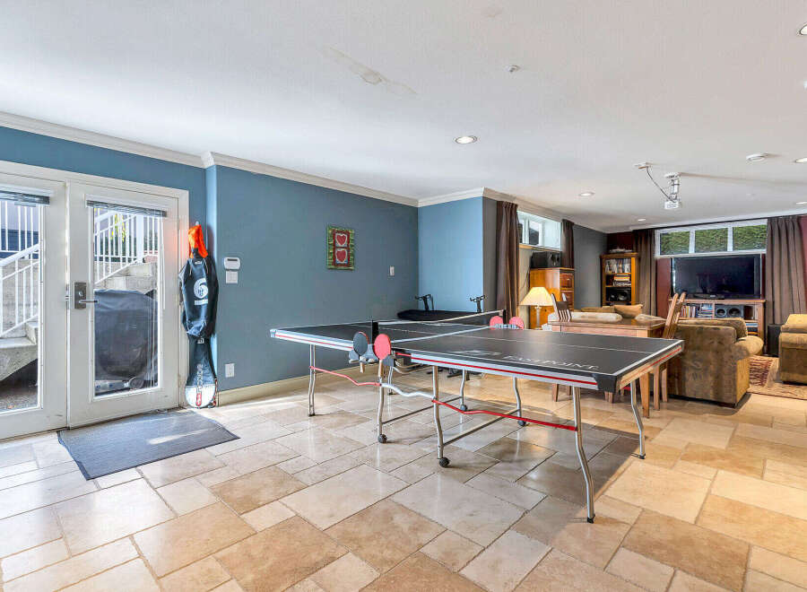 This spacious property boasts a fantastic game room, perfect for entertaining and relaxation.