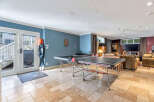 This spacious property boasts a fantastic game room, perfect for entertaining and relaxation.