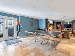 This spacious property boasts a fantastic game room, perfect for entertaining and relaxation.