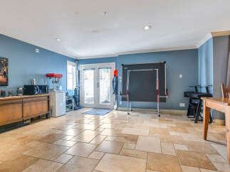This spacious property boasts a versatile interior, perfect for entertaining or relaxation.