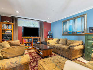Step into this inviting living space, perfect for relaxation and entertainment.