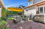 Enjoy outdoor living at its finest in this stunning property! This home features a beautifully designed patio area, perfect for relaxation and entertaining.