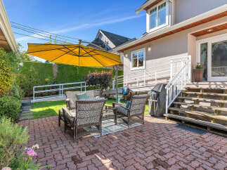 Enjoy outdoor living at its finest in this stunning property! This home features a beautifully designed patio area, perfect for relaxation and entertaining.