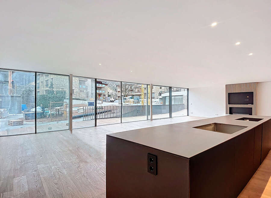 Experience modern living in this stunning property, featuring expansive floor-to-ceiling windows that flood the space with natural light and offer breathtaking views.