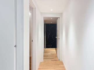 Step into this stunning property and be greeted by a bright, inviting hallway.