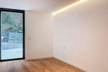 This modern interior showcases a bright and airy space with a minimalist design.