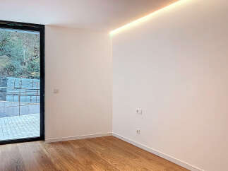 This modern interior showcases a bright and airy space with a minimalist design.