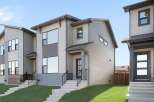 This stunning modern home boasts a sleek design with clean lines and contemporary finishes.