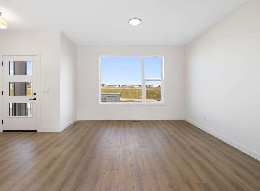 Step into this bright and airy room, featuring a modern design with clean lines and a neutral color palette.
