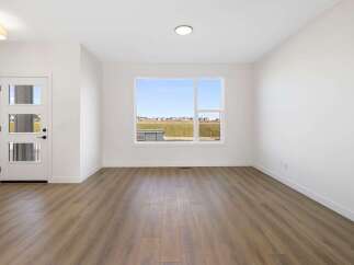 Step into this bright and airy room, featuring a modern design with clean lines and a neutral color palette.