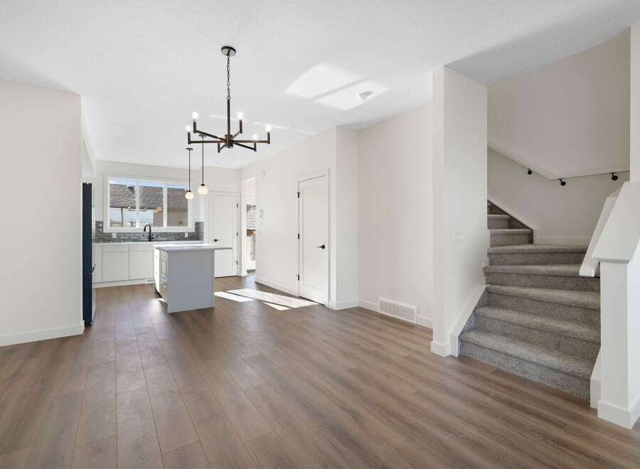 Step into this stunning home featuring a modern open-concept design.