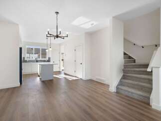 Step into this stunning home featuring a modern open-concept design.