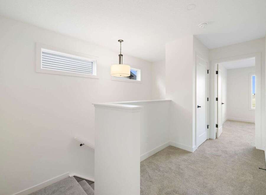 This stunning property features a bright and airy hallway with modern finishes.