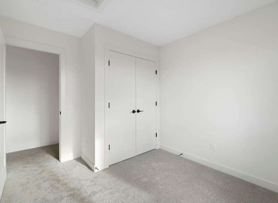 Step into this bright and airy room, perfect for a bedroom or home office.