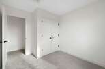 Step into this bright and airy room, perfect for a bedroom or home office.