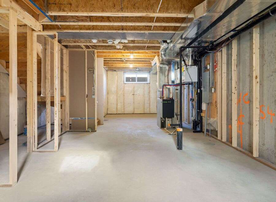 Explore the potential of this unfinished basement, offering a blank canvas for your dream living space.
