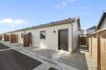 Discover this charming property featuring a modern exterior and a well-maintained facade.
