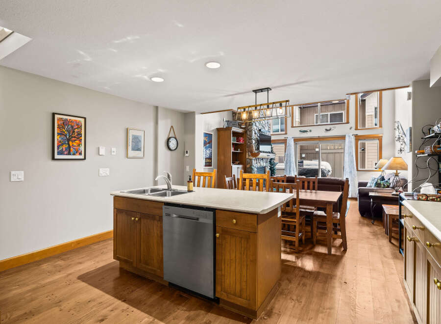 This stunning kitchen boasts a modern design with a spacious island, perfect for meal preparation and entertaining.