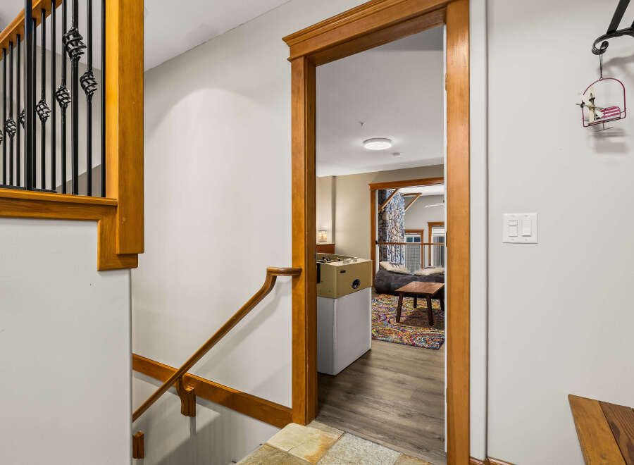 Step into this inviting space, where a blend of modern design and cozy comfort awaits.