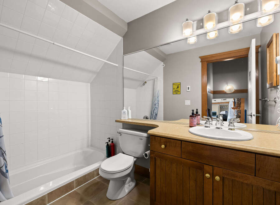 This stunning bathroom features a modern design with a spacious layout.