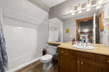 This stunning bathroom features a modern design with a spacious layout.