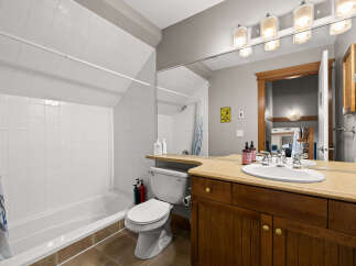 This stunning bathroom features a modern design with a spacious layout.