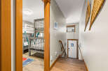 Step into this inviting space, featuring a cozy bunk bed setup perfect for family or guests.