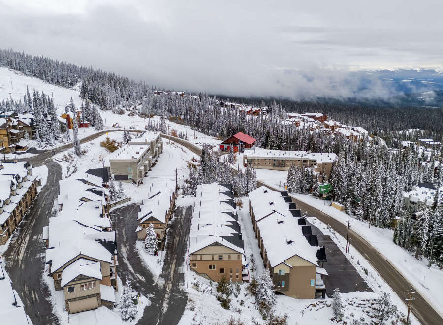 Nestled in a winter wonderland, this property offers stunning views and cozy living.
