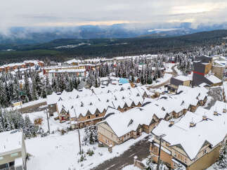 Nestled in a winter wonderland, this stunning property offers a unique blend of luxury and natural beauty.