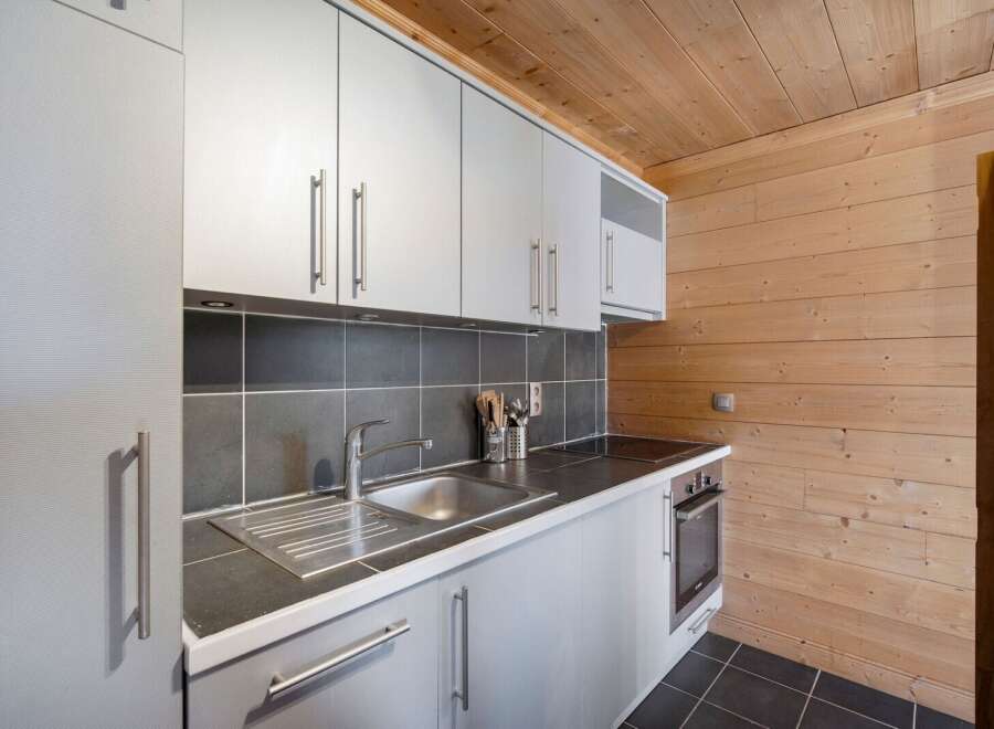 Discover this charming kitchen, perfect for culinary adventures.