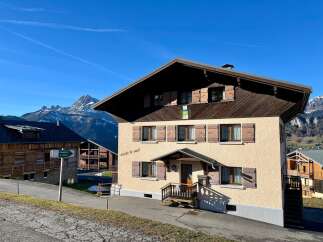 Charming chalet nestled in the heart of the mountains, offering a serene escape.
