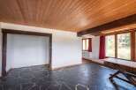 Discover the charm of this unique property featuring a stunning wooden ceiling and a distinctive stone tile floor.