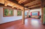 This stunning property boasts a rustic charm with its exposed wooden beams and warm, inviting atmosphere.