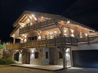 Experience the charm of this stunning wooden chalet, a perfect blend of rustic elegance and modern design.