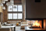 Experience the epitome of luxury living in this stunning property, featuring a cozy fireplace perfect for chilly evenings.