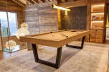 This luxurious property boasts a stunning billiards room, perfect for entertaining guests or enjoying a relaxing evening.