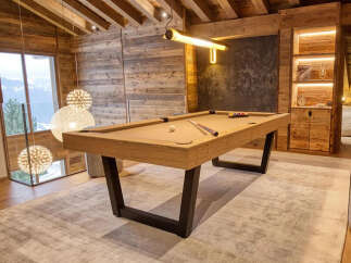 This luxurious property boasts a stunning billiards room, perfect for entertaining guests or enjoying a relaxing evening.