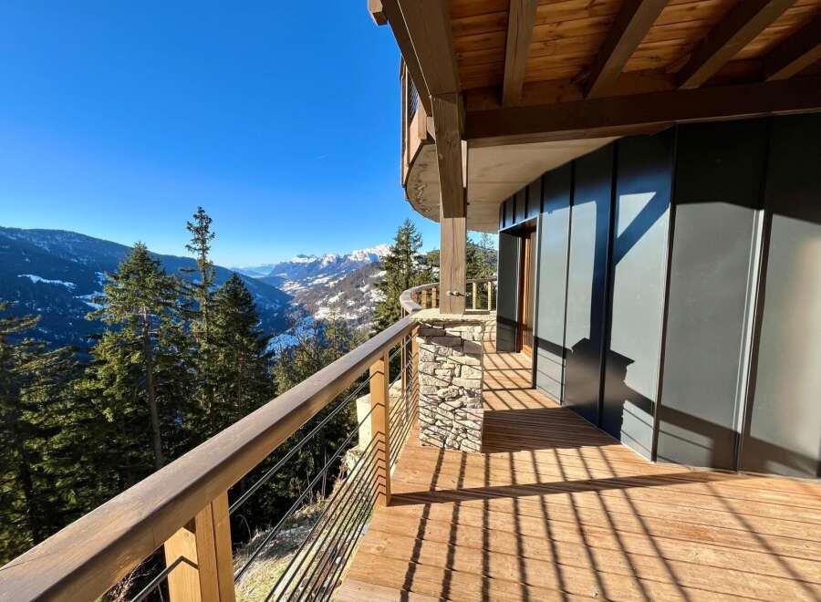 Experience breathtaking mountain views from this stunning property.