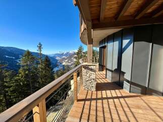 Experience breathtaking mountain views from this stunning property.