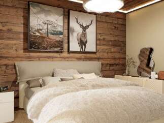 This cozy bedroom features a rustic wooden wall, creating a warm and inviting atmosphere.