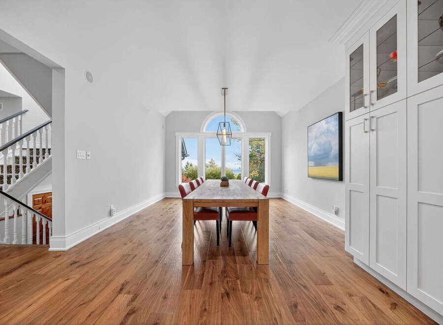 This stunning dining room boasts a modern design with a touch of elegance.