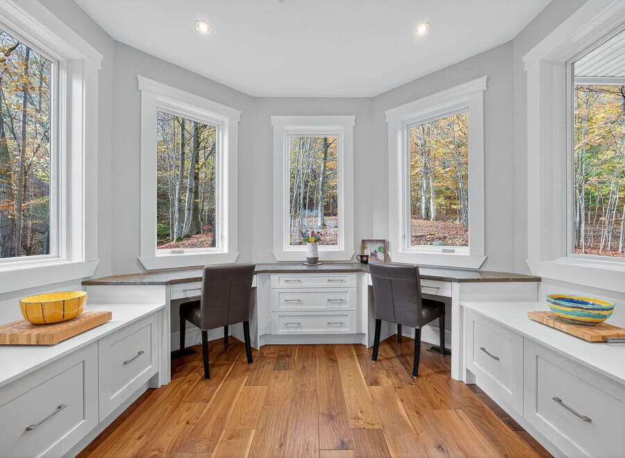 This stunning property boasts a bright and airy home office space, perfect for remote work or creative endeavors.