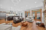Step into luxury with this stunning open-concept living space! Featuring a gourmet kitchen, cozy seating areas, and expansive windows, this home is perfect for entertaining.