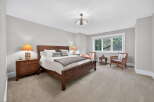 This inviting bedroom features a cozy atmosphere with a comfortable bed and stylish decor.