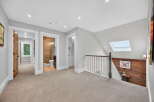 This stunning property features a beautifully designed hallway with access to multiple rooms.