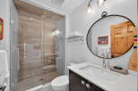 Step into luxury with this beautifully designed bathroom! Featuring a modern glass shower, elegant vanity, and stylish lighting, this space offers both functionality and sophistication.